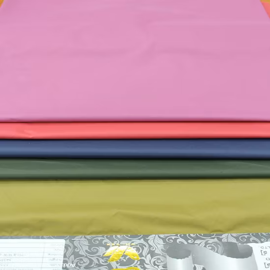 100% ナイロン タスロンとニット生地を組み合わせた衣服